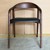 Factory Direct Sales of Modern Design Walnut-colored Solid Wood Dining Chairs with Laser-engraved, Nail-free Seat Panels And PU Cushions.